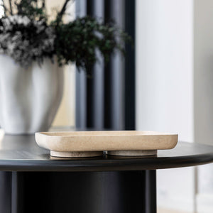 Stone bowl on wooden table
