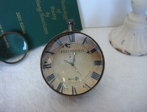 Eye Of Time Clock - Library by AUTHENTIC MODELS (stand-for-eye-of-time-nickel-14)