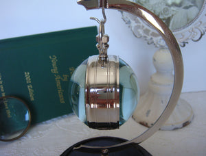 Eye Of Time Clock - Nickel by AUTHENTIC MODELS (stand-for-eye-of-time-nickel-13)