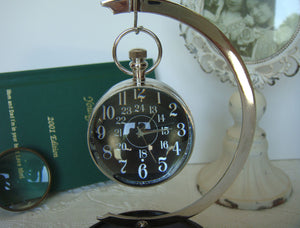 Eye Of Time Clock - Nickel by AUTHENTIC MODELS (stand-for-eye-of-time-nickel-13)