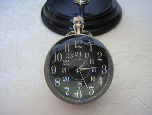 Eye Of Time Clock - Nickel by AUTHENTIC MODELS (stand-for-eye-of-time-nickel-13)