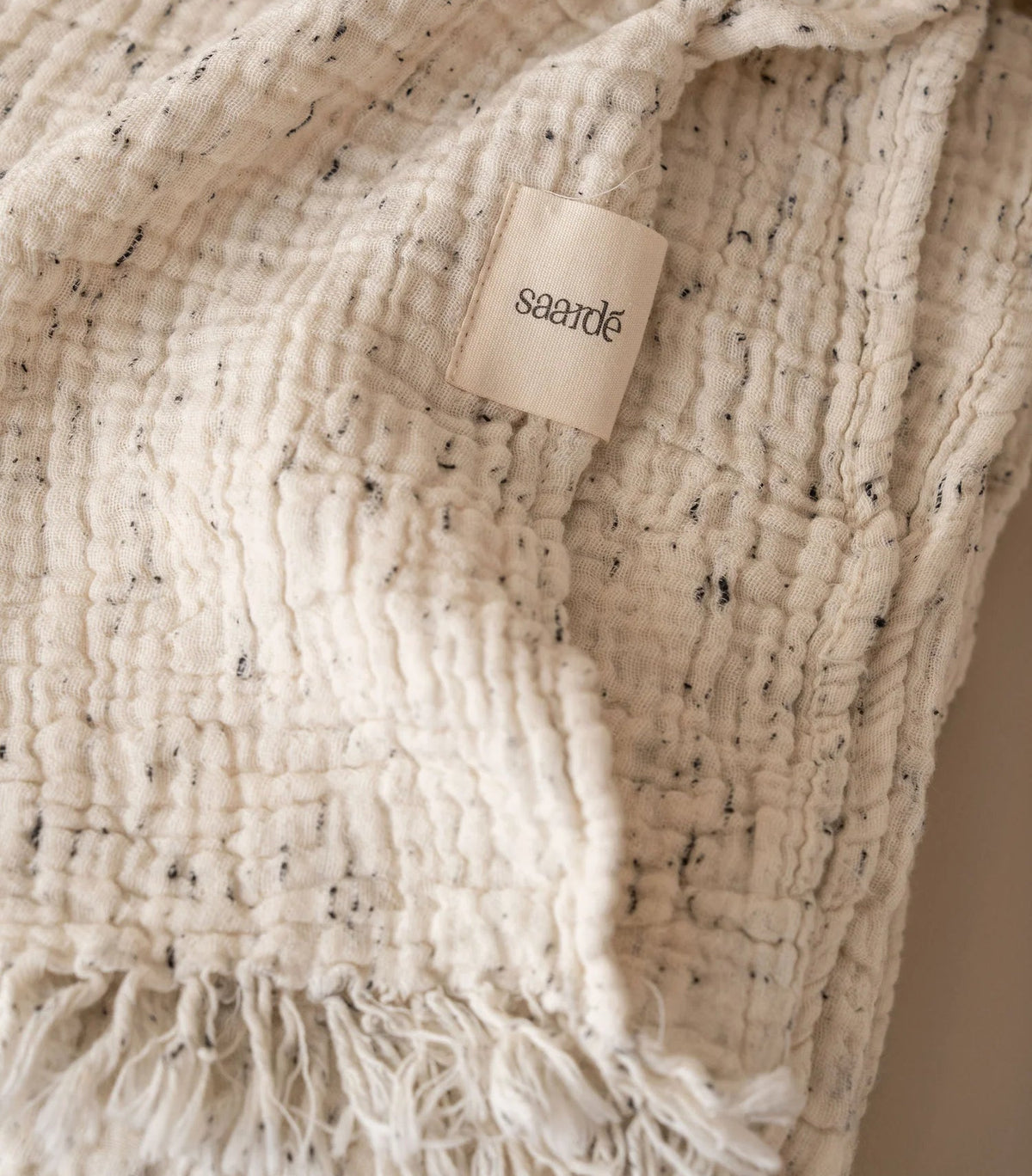 Enes Throw | Cream/Black Speckle by SAARDÉ (saarde-arches-throw-black-off-white)