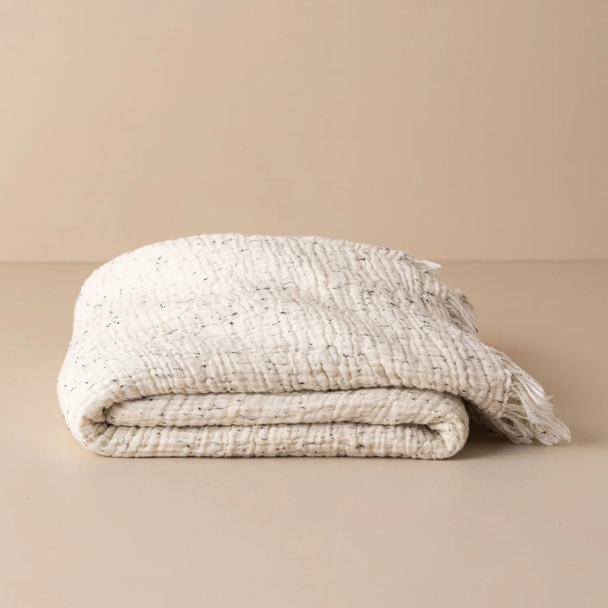 Enes Throw | Cream/Black Speckle by SAARDÉ (saarde-arches-throw-black-off-white)