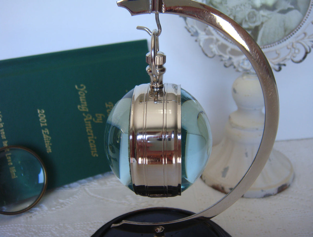 Eye Of Time Clock - Nickel by AUTHENTIC MODELS (stand-for-eye-of-time-nickel-13)