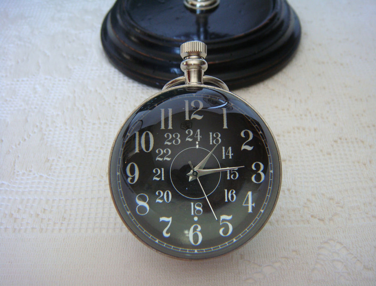 Eye Of Time Clock - Nickel by AUTHENTIC MODELS (stand-for-eye-of-time-nickel-13)