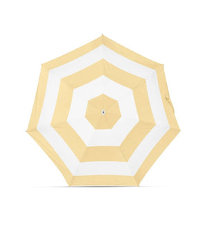 Yellow and white striped beach Anatole umbrella on a white background